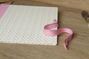 Sweet school folder with pink floral pattern and pink cotton ribbon